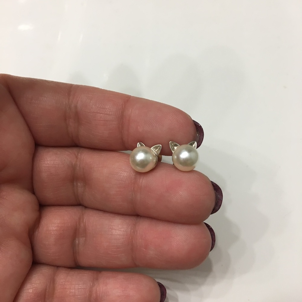Kitty Cat pearl earrings.